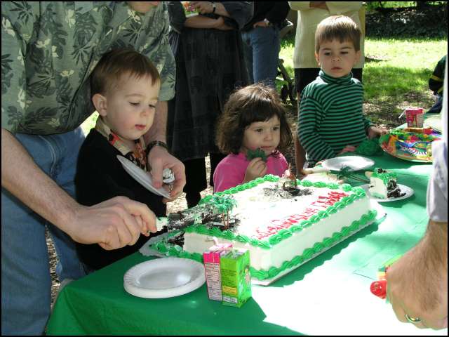 I'll just munch on this while Ryan and his Daddy slice up the cake