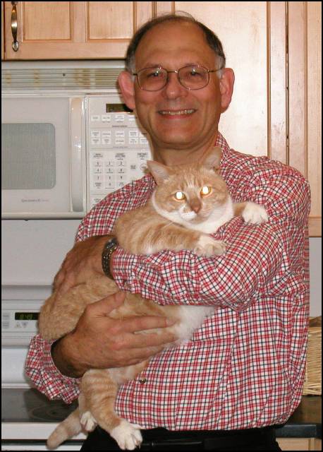 Barnaby loves to be petted and/or held