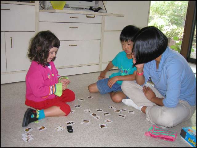 Playing a card game with Edith at Zoe's
