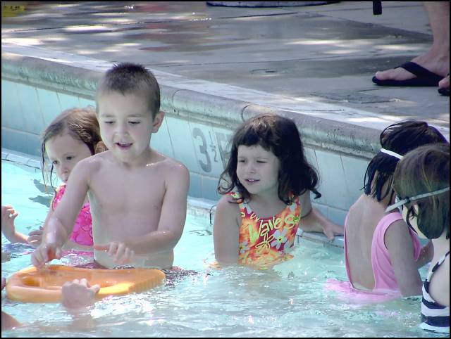 The two teachers take each child in turn for a lesson