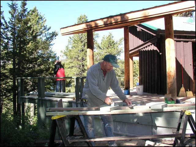 Randy starts on the stairs to the deck