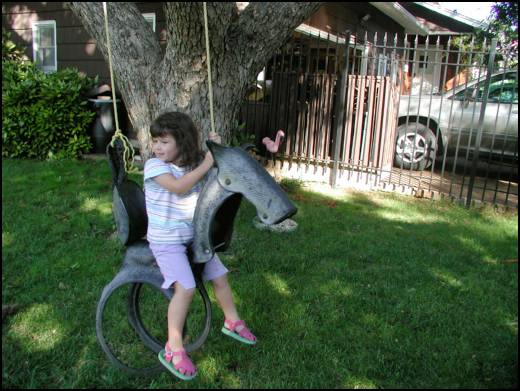 Time to ride the horse swing outside
