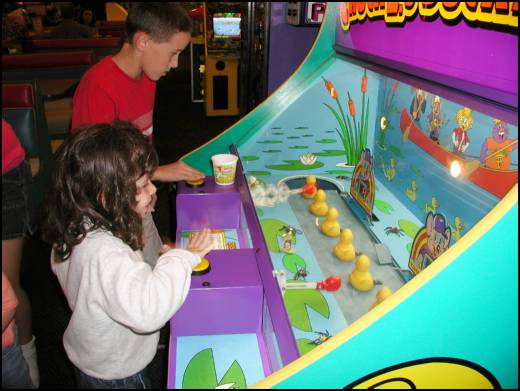Then you push the buttons and Criag trys to know the duckies over