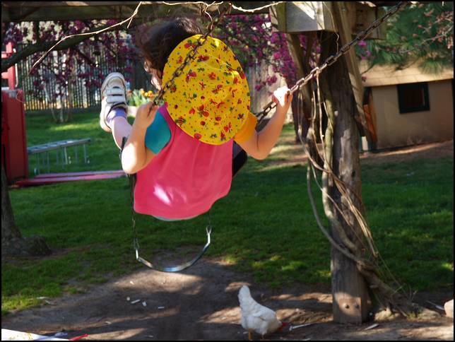 Sydney is learning to pump the swing