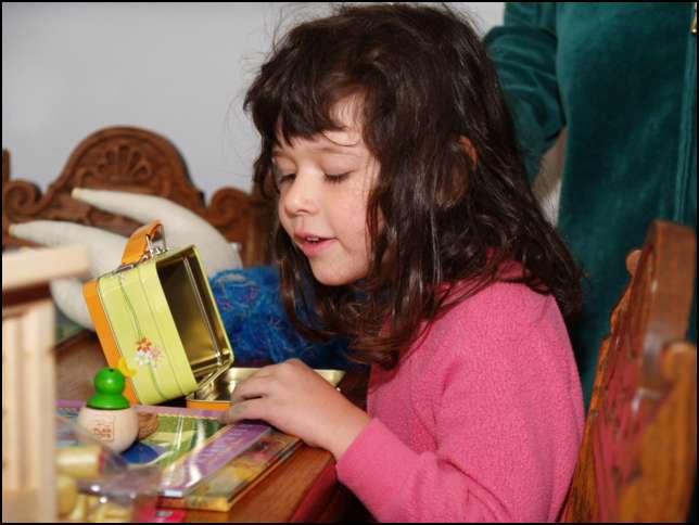 Sydney discovers the toys and books that the Easter Bunny left