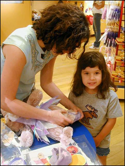 Cousin Laura is helping me get bunny dressed