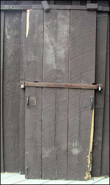 Wow -- bear attack on the door -- note paw prints lower right and upper left