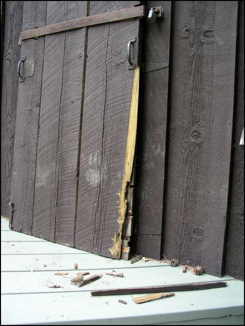 The bear tried hard but the door held!