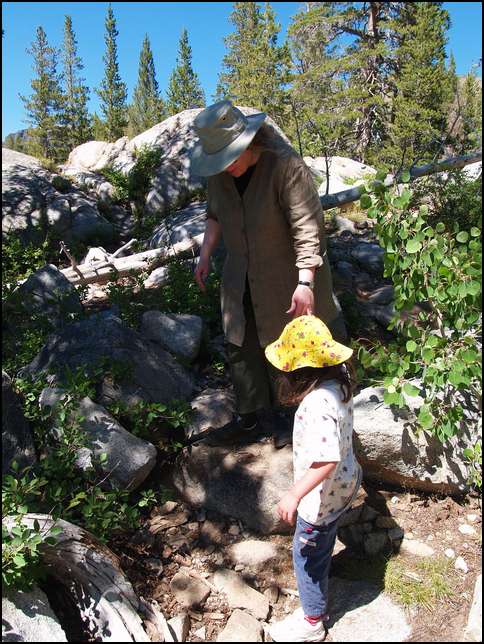 Sydney helps Mommy down the rocks
