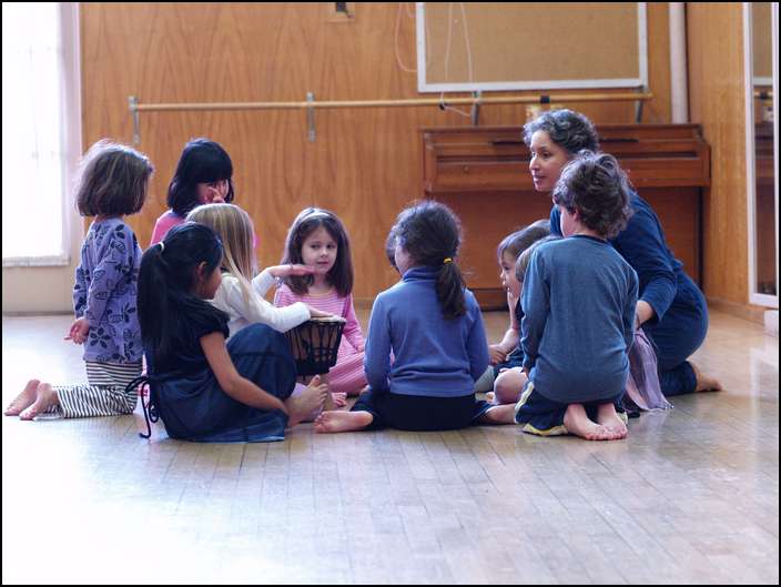 The class ends with students talking about their dancing with a drum