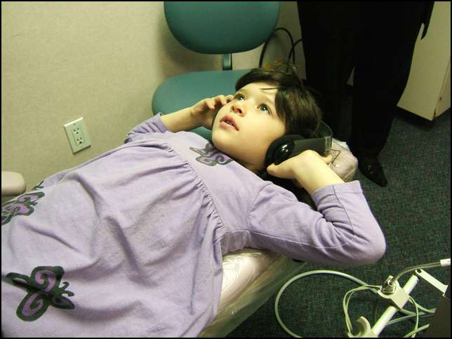 Waiting for the dentist -- watching a DVD movie in the ceiling with wireless earphones