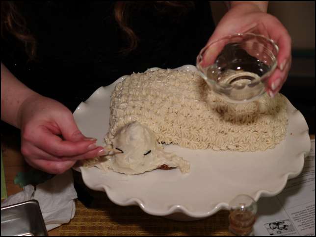 Decorating the lambie-pie carrot cake