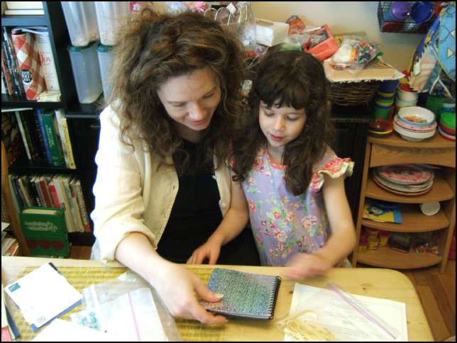 Before driving to the city for brunch, Sydney showed Mommy her sparkle book
