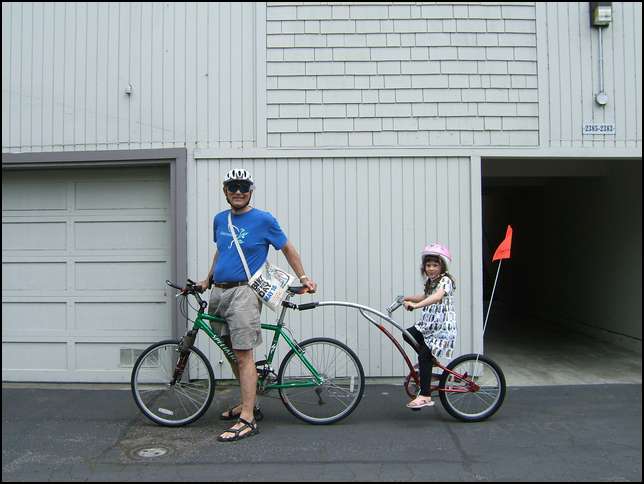 Sydney on her trail-a-bike 