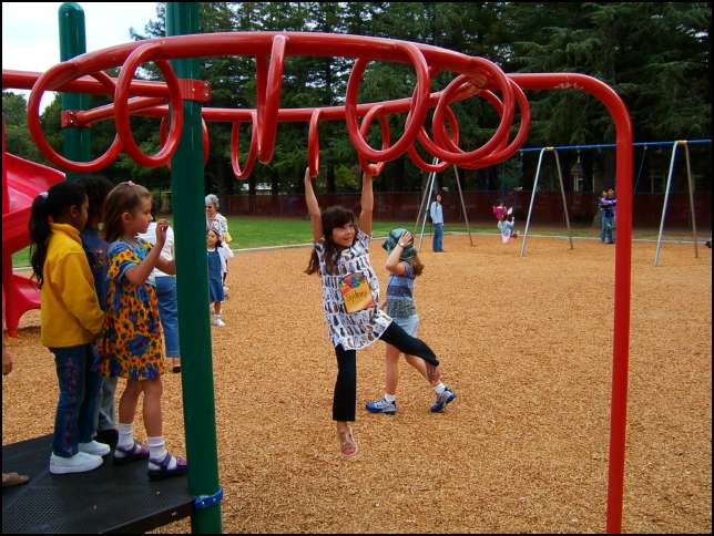 Here I go -- on the circular monkey bars