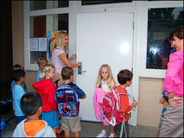 Her comes Miss Tyler -- she was escorting five kids who rode the bus this morning